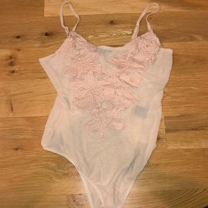 “Missguided” mesh bodysuit